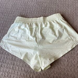 Athleta light lime colored shorts